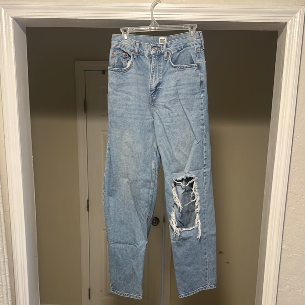 Woman’s Light Blue Distressed Jeans